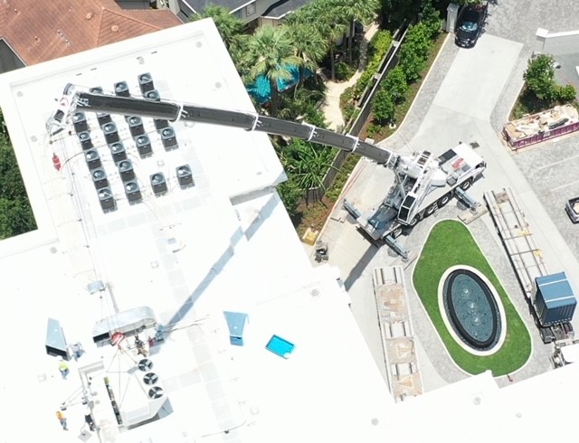 <p>Hoisting rooftop unit on to 6 story building in Memorial area, Houston. </p>